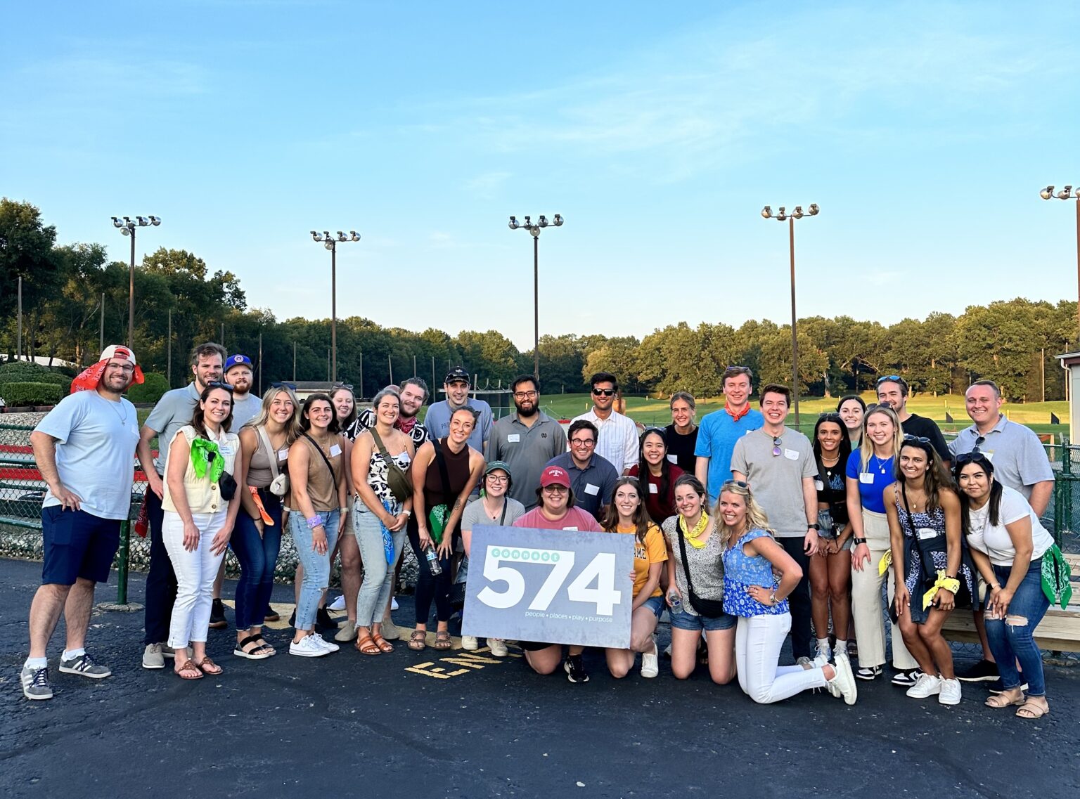 A group photo of Connect 574 members at a social event at Hacker's Golf and Games